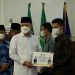 Gubernur Rohidin Salurkan Bantuan Zakat untuk Pendidikan dan UMKM