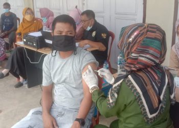 Fasilitasi Vaksinasi Massal, Kades Air Buluh Optimis Dosis 1Tuntas