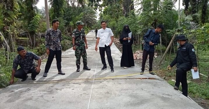 Pemdes Tanjung Medan Gelar Monev Pembangunan Jalan Desa