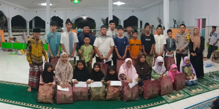 Berbagi Cahaya Kasih di Malam Ramadhan: Kisah Santunan Anak Yatim dari Pemdes Pasar Baru